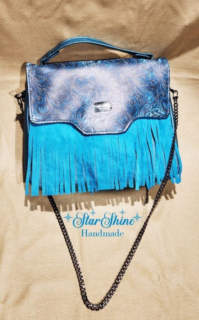 Turquoise Blue Amatista Shoulder Bag. Front view.