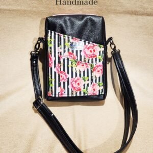 Black Striped Pixie crossbody in a gorgeous striped pink rose print.