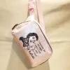 Pearl Pink Convertible Crossbody featuring a vintage inspired sarcastic quote “I Checked My Receipt, I didn't buy any of your bullshit”.
