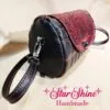 Black and Metallic Red Hearts Barrel Crossbody. Side View