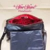 Black and Metallic Red Hearts Barrel Crossbody. Interior View