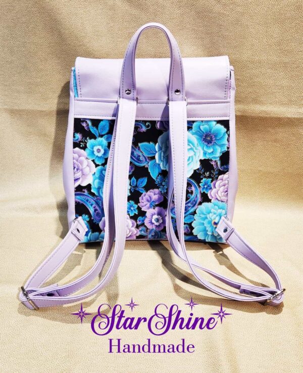 Lavender and Blue Floral Meraki Backpack. Rear View