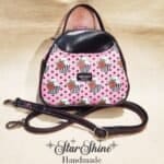Pink Polka-Dot Cupcake Bowler Bag. With adjustable crossbody strap.