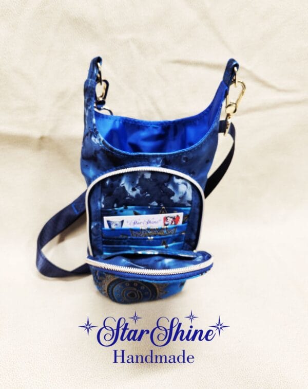 Full front view of Blue Sun and Moon H2o2Go Crossbody Bag showing front pocket.