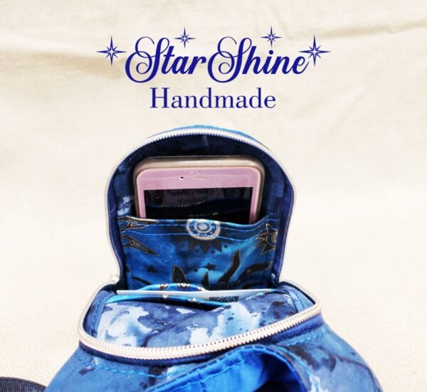Interior view of Blue Sun and Moon H2o2Go Crossbody Bag with cell phone pocket.