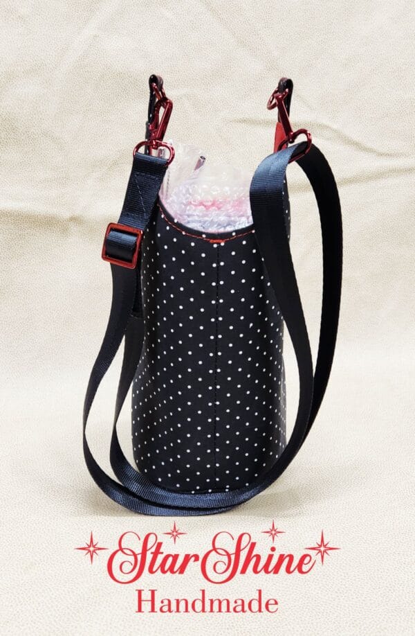 Rear view of Aqua Daisy H2o2Go Crossbody Bag