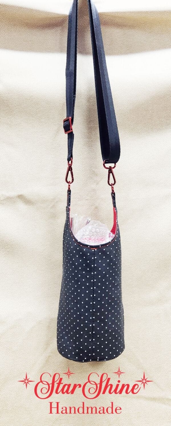 Rear view of Aqua Daisy H2o2Go Crossbody Bag