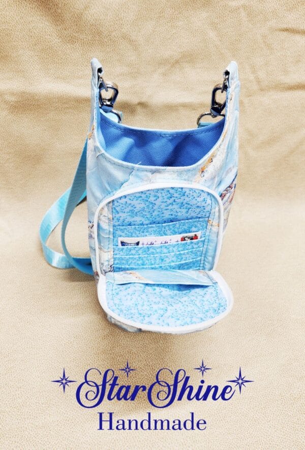 Front view of Light Blue Marbled H2o2Go Crossbody Bag showing front pocket.