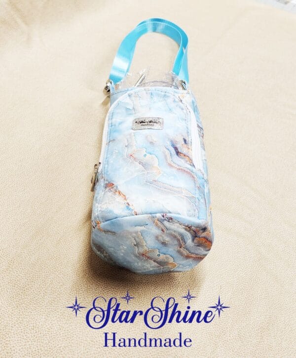 Bottom view of Light Blue Marbled H2o2Go Crossbody Bag