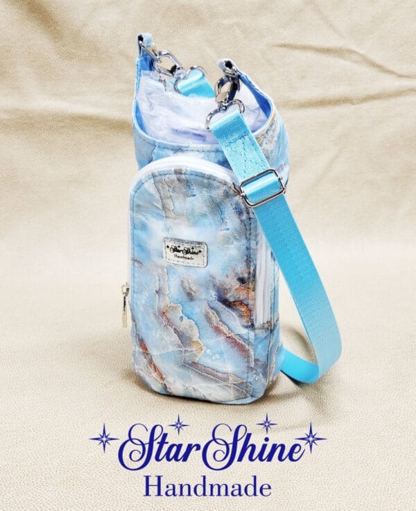 Front view of Light Blue Marbled H2o2Go Crossbody Bag