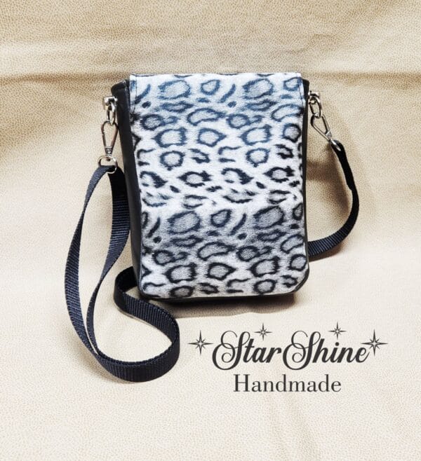 Black and White Snow Leopard Mini Mallory Crossbody. Rear View.