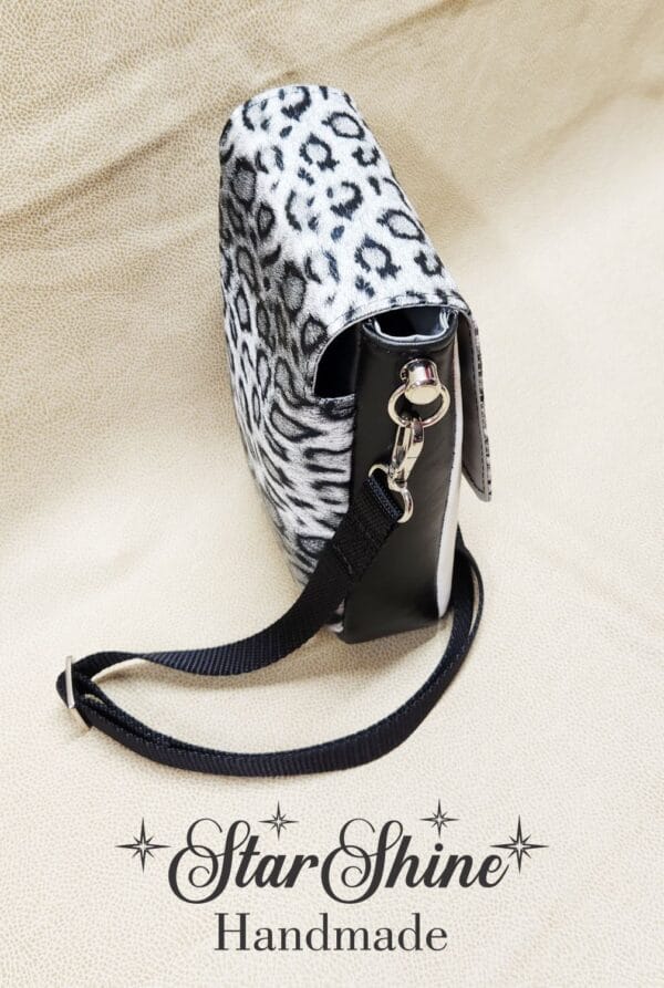 Black and White Snow Leopard Mini Mallory Crossbody. Upper Side View.