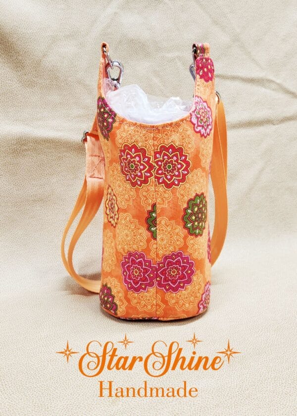 Rear view of Orange Floral Mandala H2o2Go Crossbody Bag
