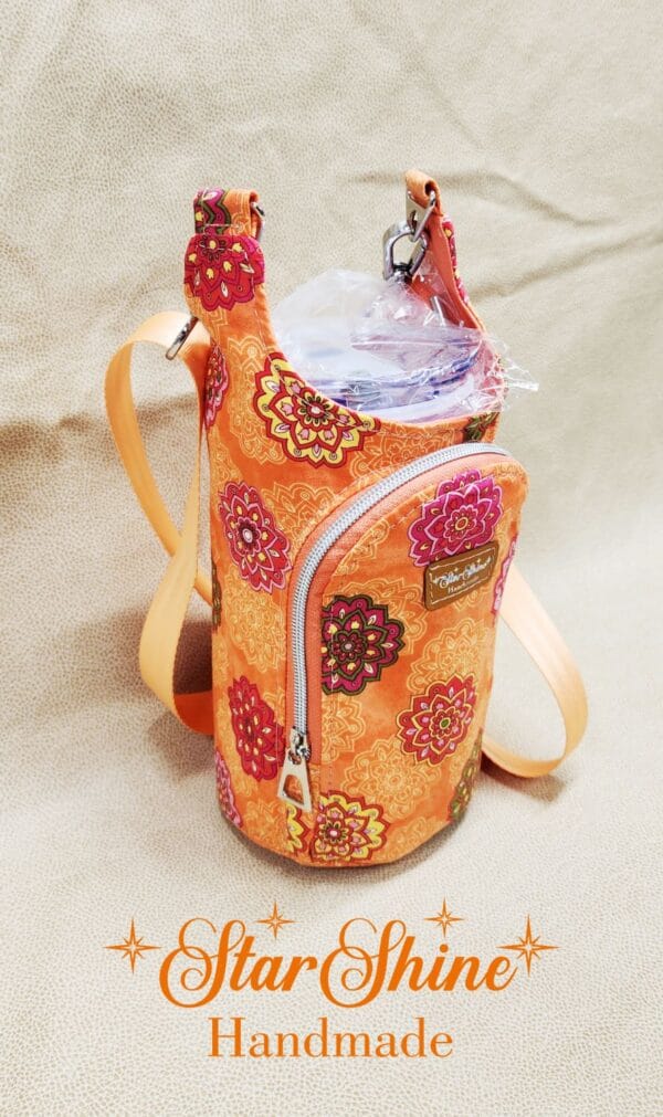 Side view of Orange Floral Mandala H2o2Go Crossbody Bag