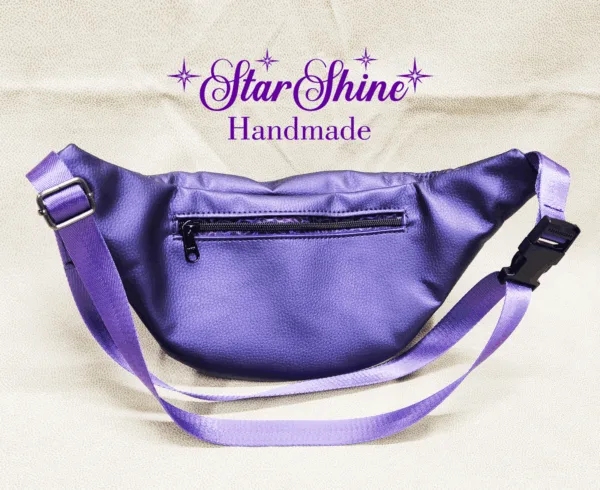Rear view of exterior with zipper pocket of Purple Ferris Hip Bag and Sling.