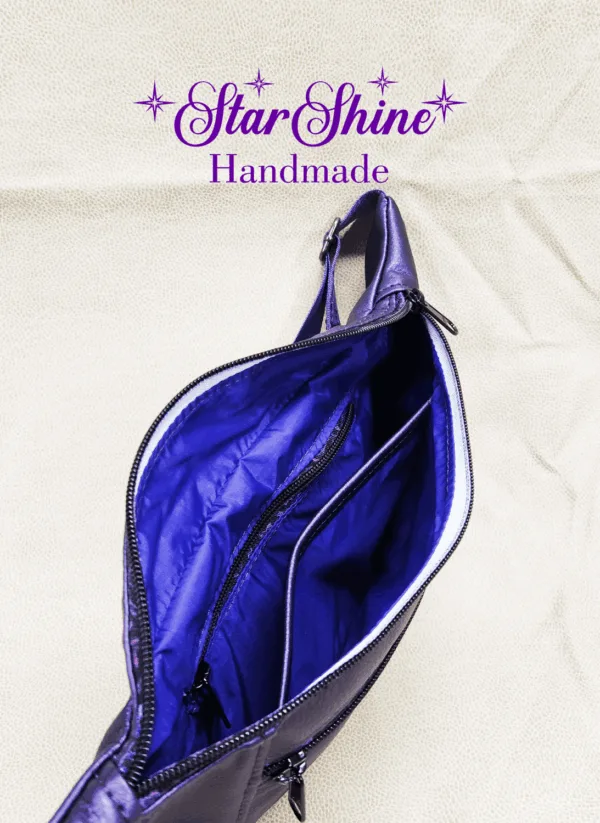 Interior view of pockets on Purple Ferris Hip Bag and Sling.