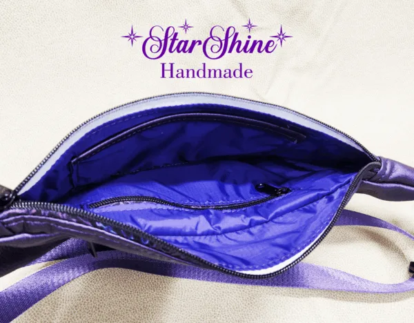 Interior view of slip pocket on Purple Ferris Hip Bag and Sling.