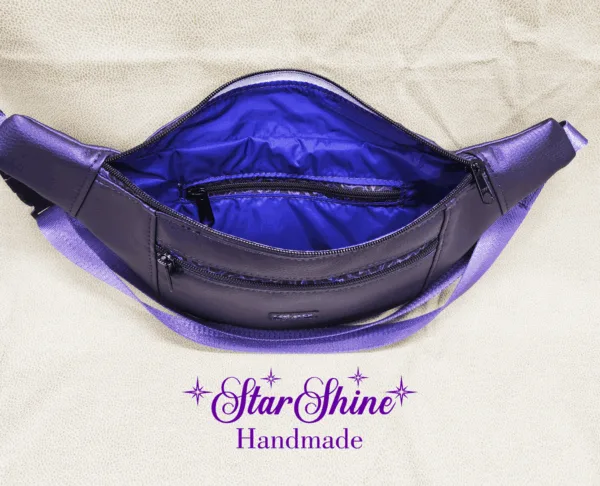 Interior view of zipper pocket on Purple Ferris Hip Bag and Sling.