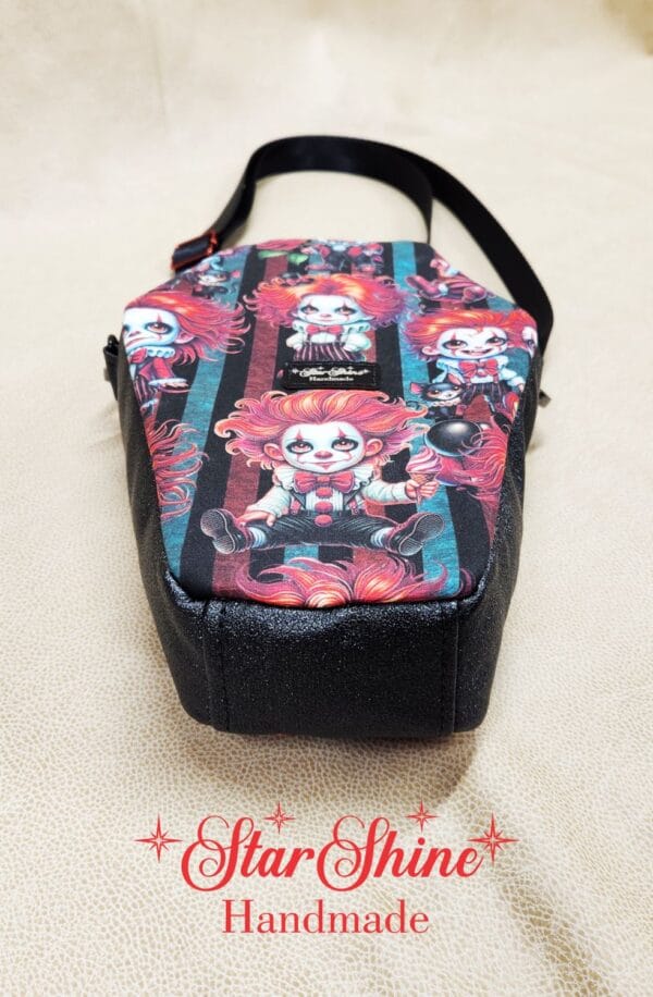 Creepy Clowns Coffin Crossbody. Bottom View.