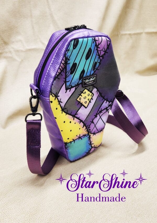 NBC Sally Printed Coffin Crossbody. Side View.