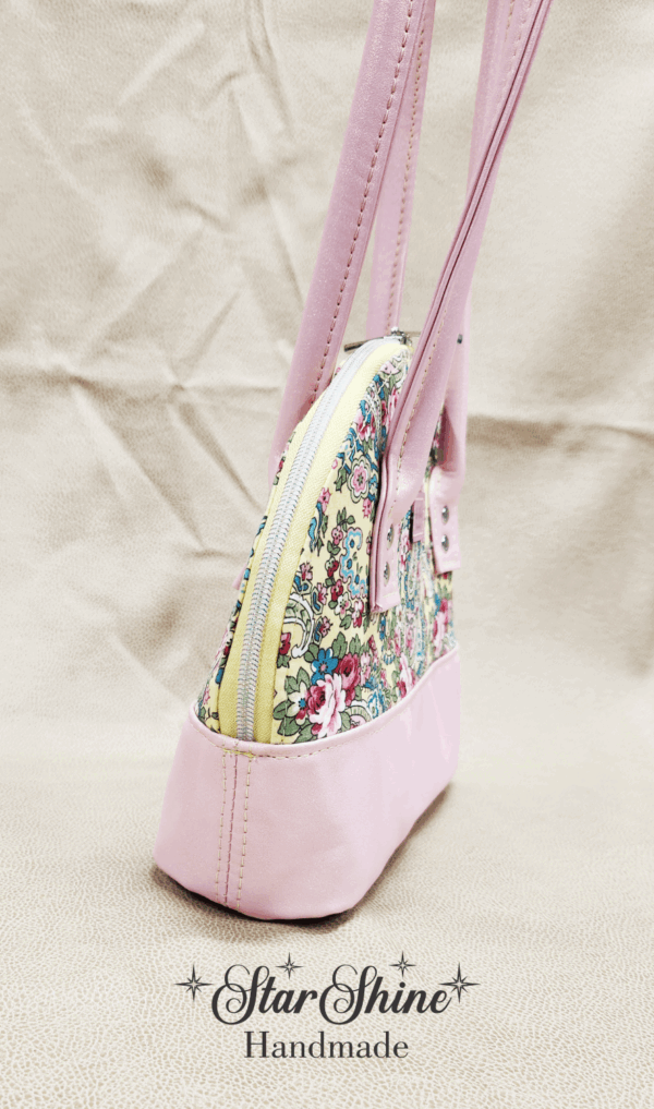 Yellow and Pink Paisley Floral Bowler. Side View.