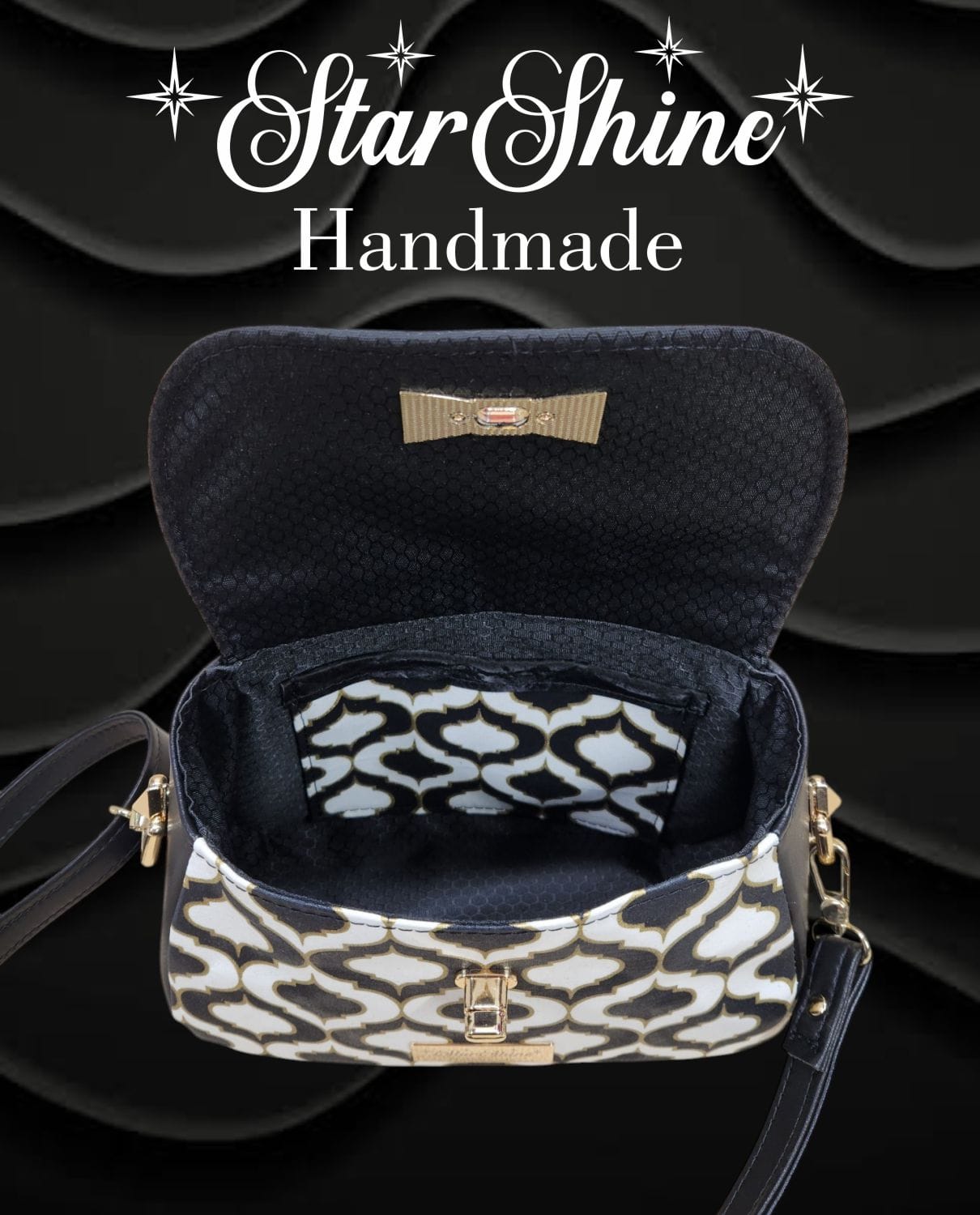 Black and Gold Mabel Crossbody. Flap Open Showing Interior View.