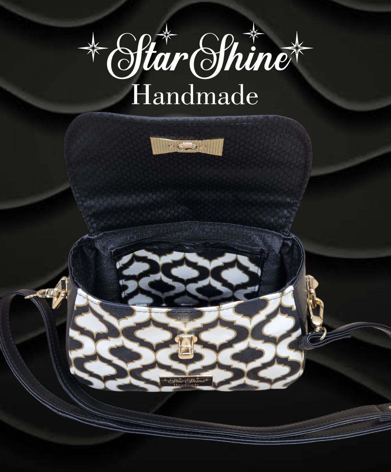 Black and Gold Mabel Crossbody. Flap Open Showing Interior View.