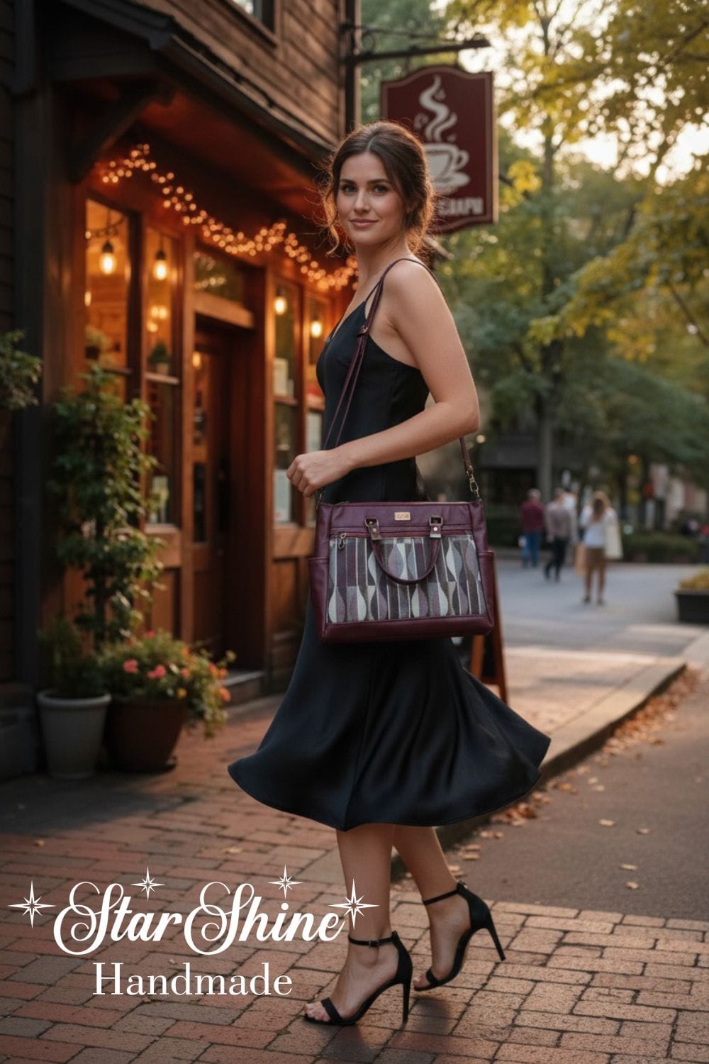 Burgundy Classic Tote. Worn by model.